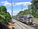 Westbound NJT Train # 3949 is about to pass the depot with a Multilevel Cab Car leading